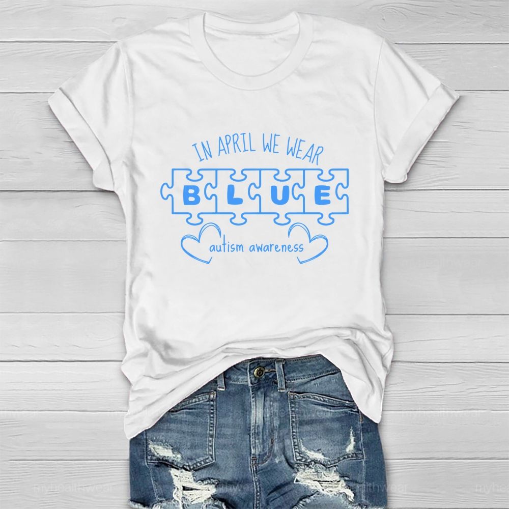 In April We Wear Blue for Autism Awareness Puzzle Piece Letters Love Healthwear T-shirt