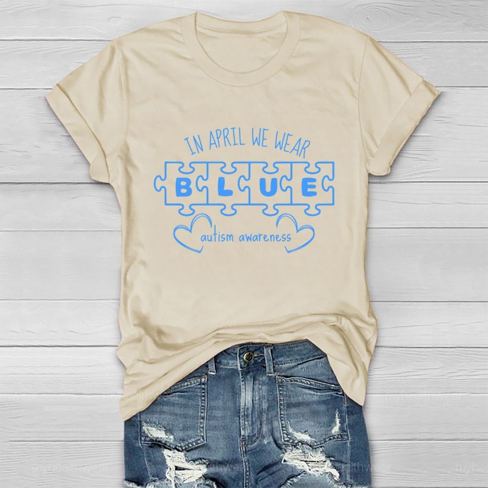 In April We Wear Blue for Autism Awareness Puzzle Piece Letters Love Healthwear T-shirt