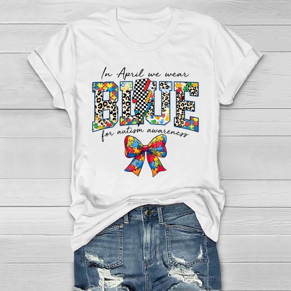 In April We Wear Blue For Autism Awareness Colorful Puzzle Bow Healthwear T-shirt