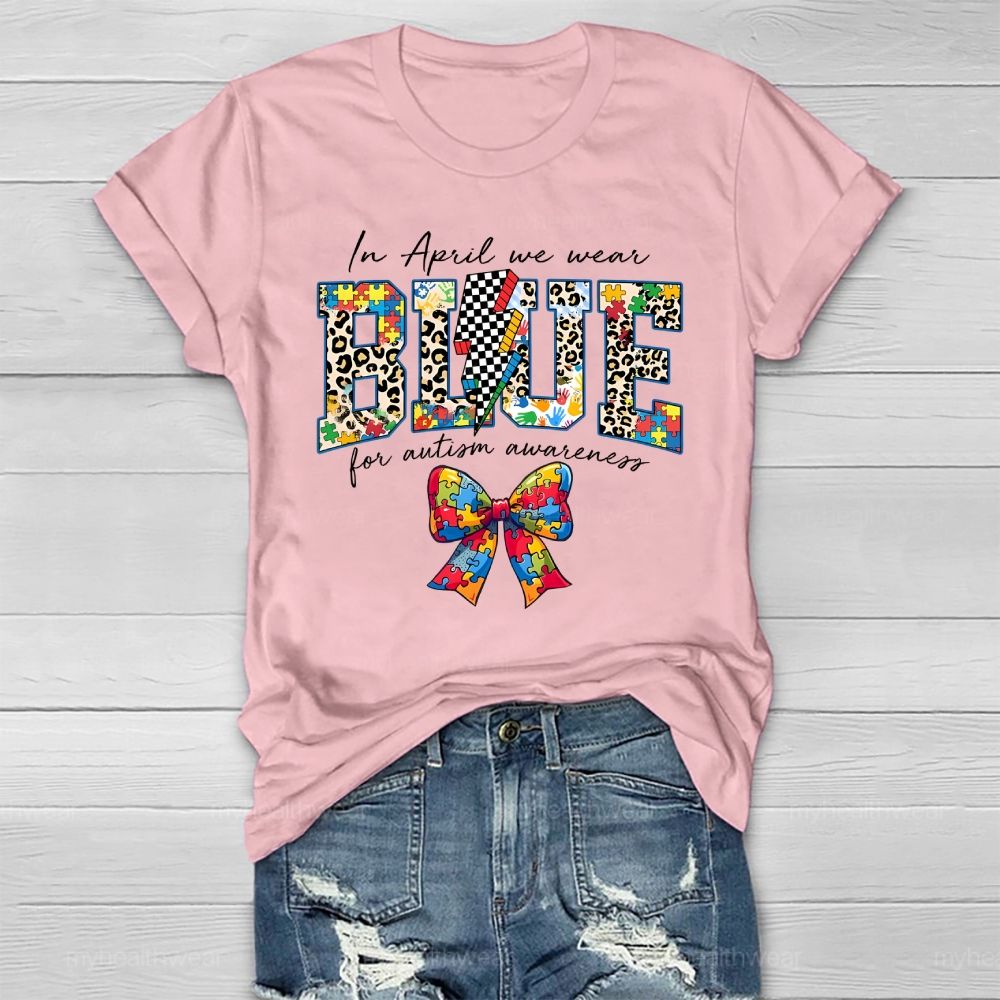 In April We Wear Blue For Autism Awareness Colorful Puzzle Bow Healthwear T-shirt