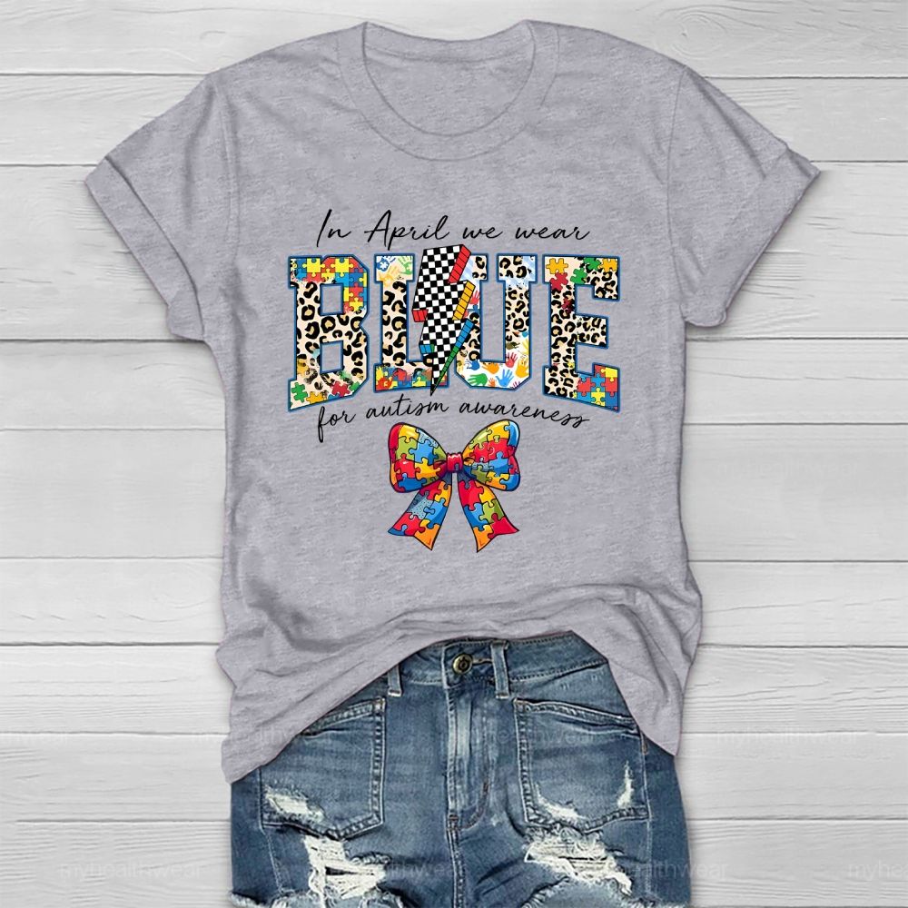 In April We Wear Blue For Autism Awareness Colorful Puzzle Bow Healthwear T-shirt
