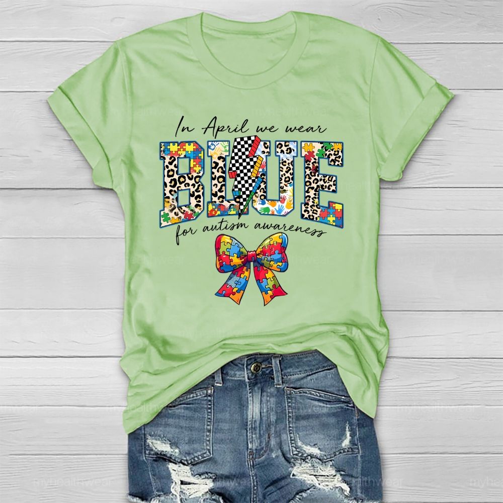 In April We Wear Blue For Autism Awareness Colorful Puzzle Bow Healthwear T-shirt