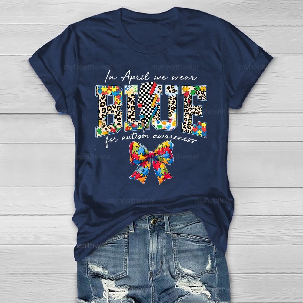 In April We Wear Blue For Autism Awareness Colorful Puzzle Bow Healthwear T-shirt