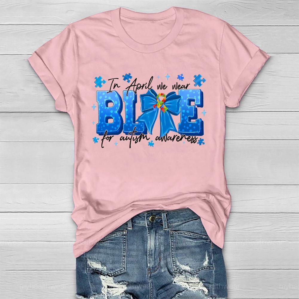 In April We Wear Blue For Autism Awareness Blue Ribbon Puzzle Ribbon Healthwear T-shirt
