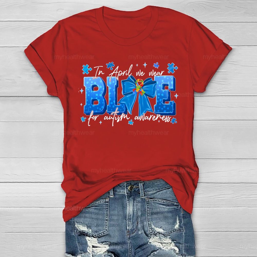 In April We Wear Blue For Autism Awareness Blue Ribbon Puzzle Ribbon Healthwear T-shirt