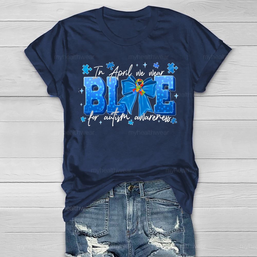 In April We Wear Blue For Autism Awareness Blue Ribbon Puzzle Ribbon Healthwear T-shirt