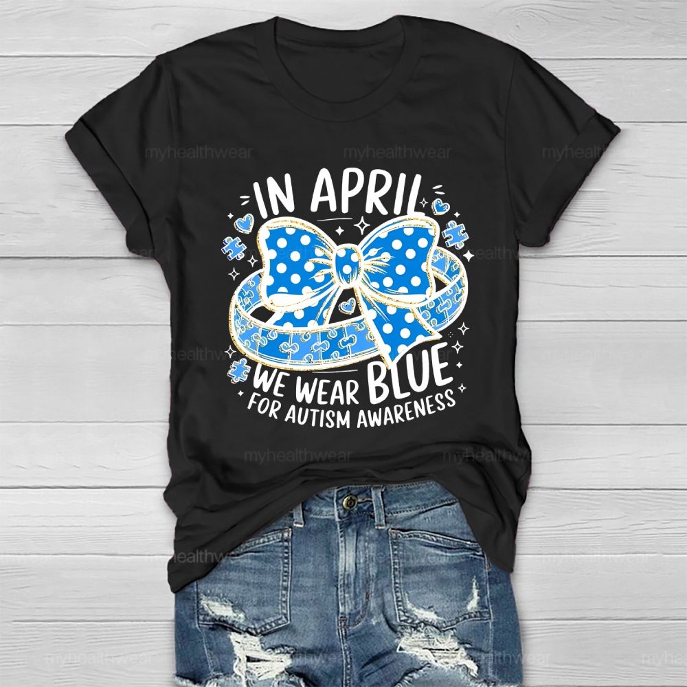 In April We Wear Blue For Autism Awareness Puzzle Pieces Polka Dots Bows Healthwear T-shirt