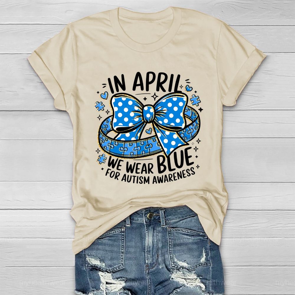 In April We Wear Blue For Autism Awareness Puzzle Pieces Polka Dots Bows Healthwear T-shirt