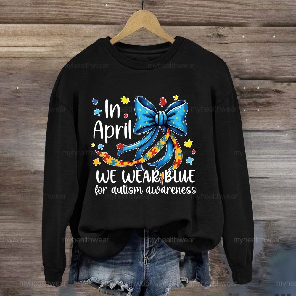 In April We Wear Blue For Autism Awareness Puzzle Piece Bow Sweatshirt