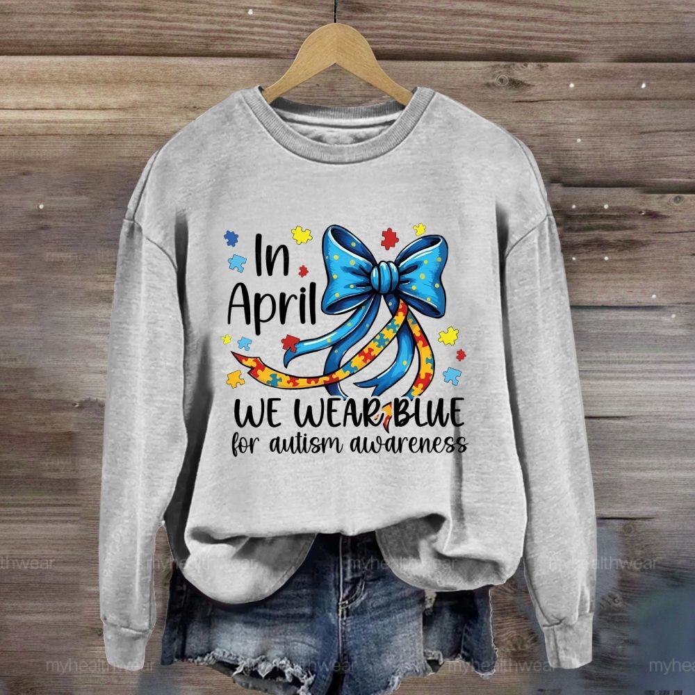 In April We Wear Blue For Autism Awareness Puzzle Piece Bow Sweatshirt