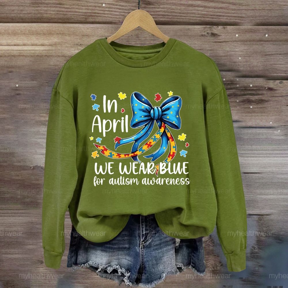 In April We Wear Blue For Autism Awareness Puzzle Piece Bow Sweatshirt