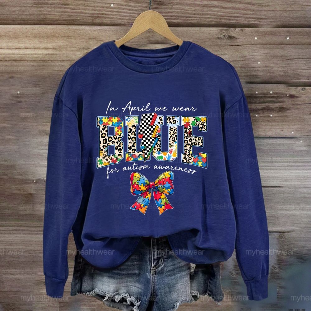 In April We Wear Blue For Autism Awareness Colorful Puzzle Bow Sweatshirt