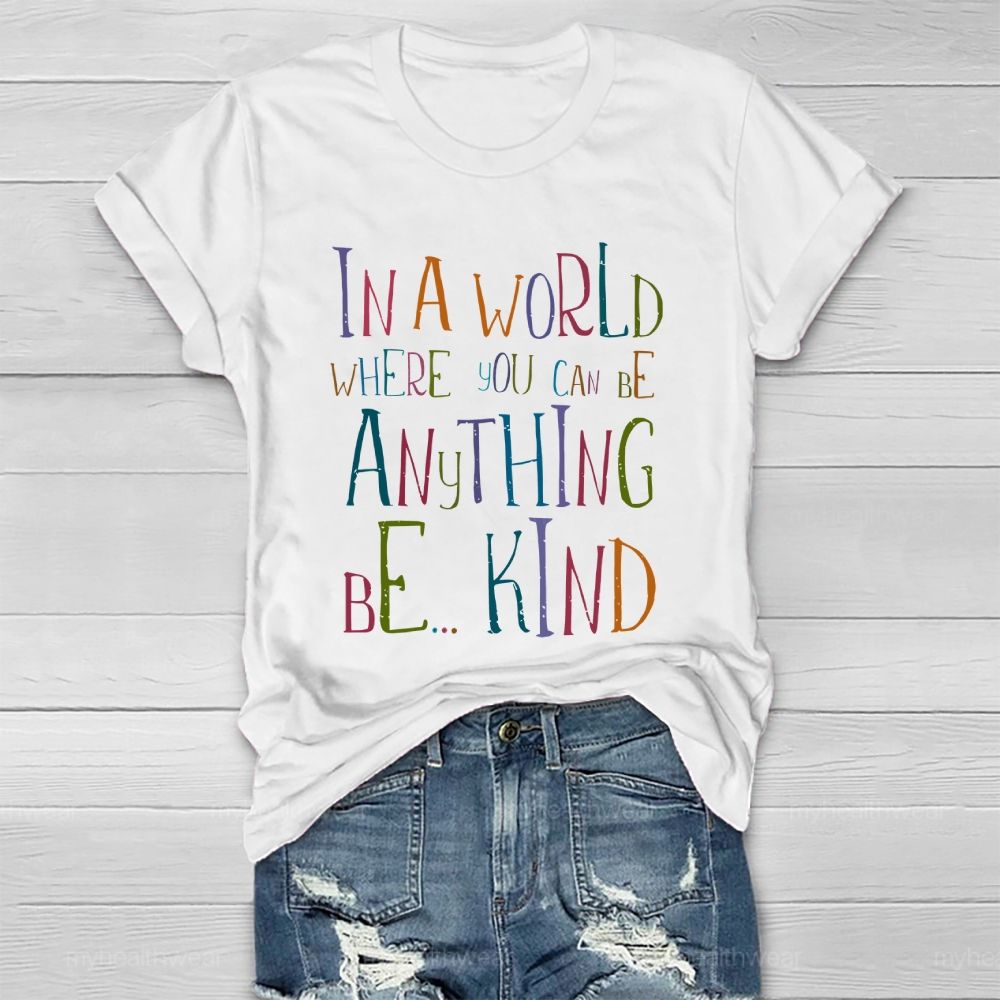 In A World Where You Can Be Anything Be... Kind Colorful Letters Graphics Healthwear T-shirt