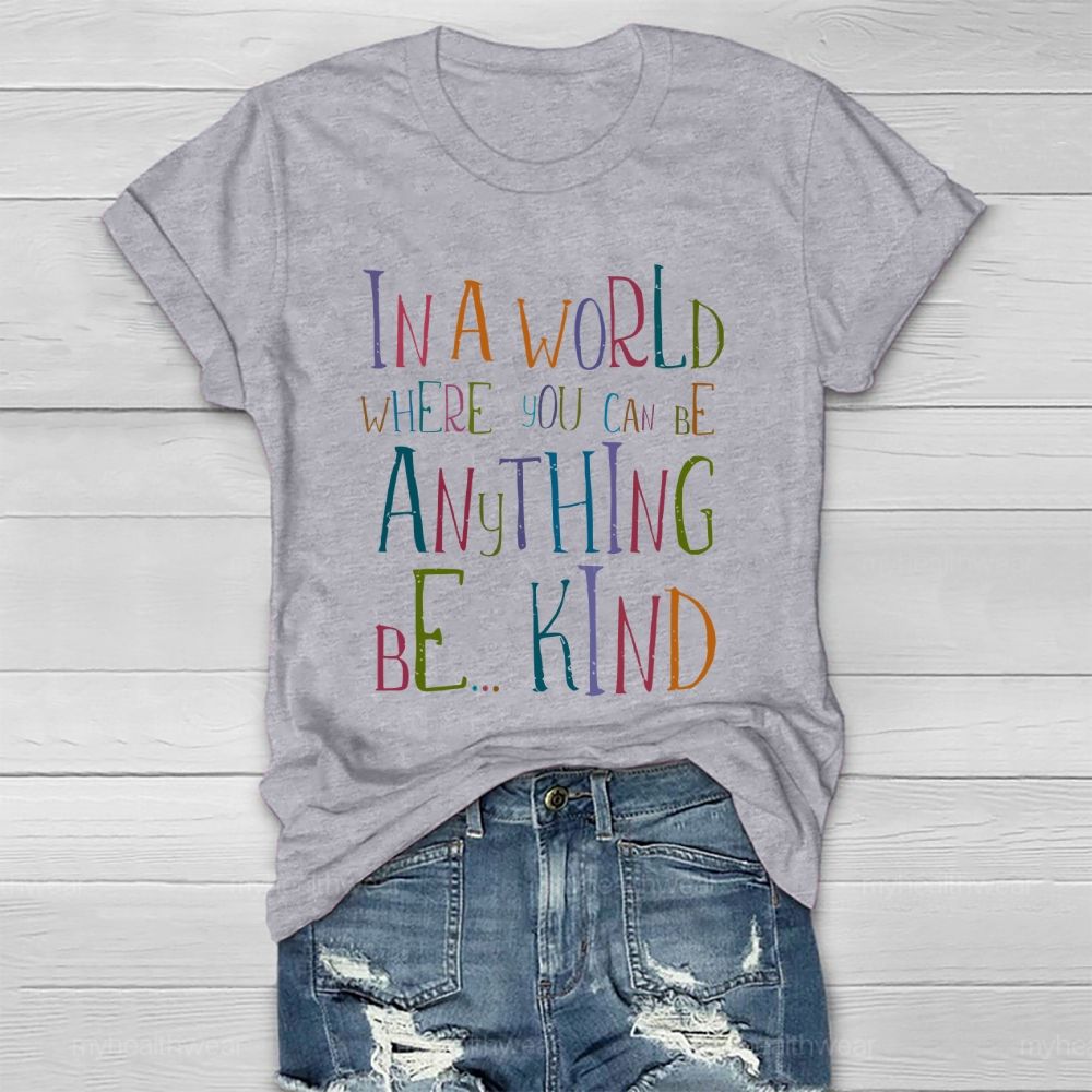 In A World Where You Can Be Anything Be... Kind Colorful Letters Graphics Healthwear T-shirt