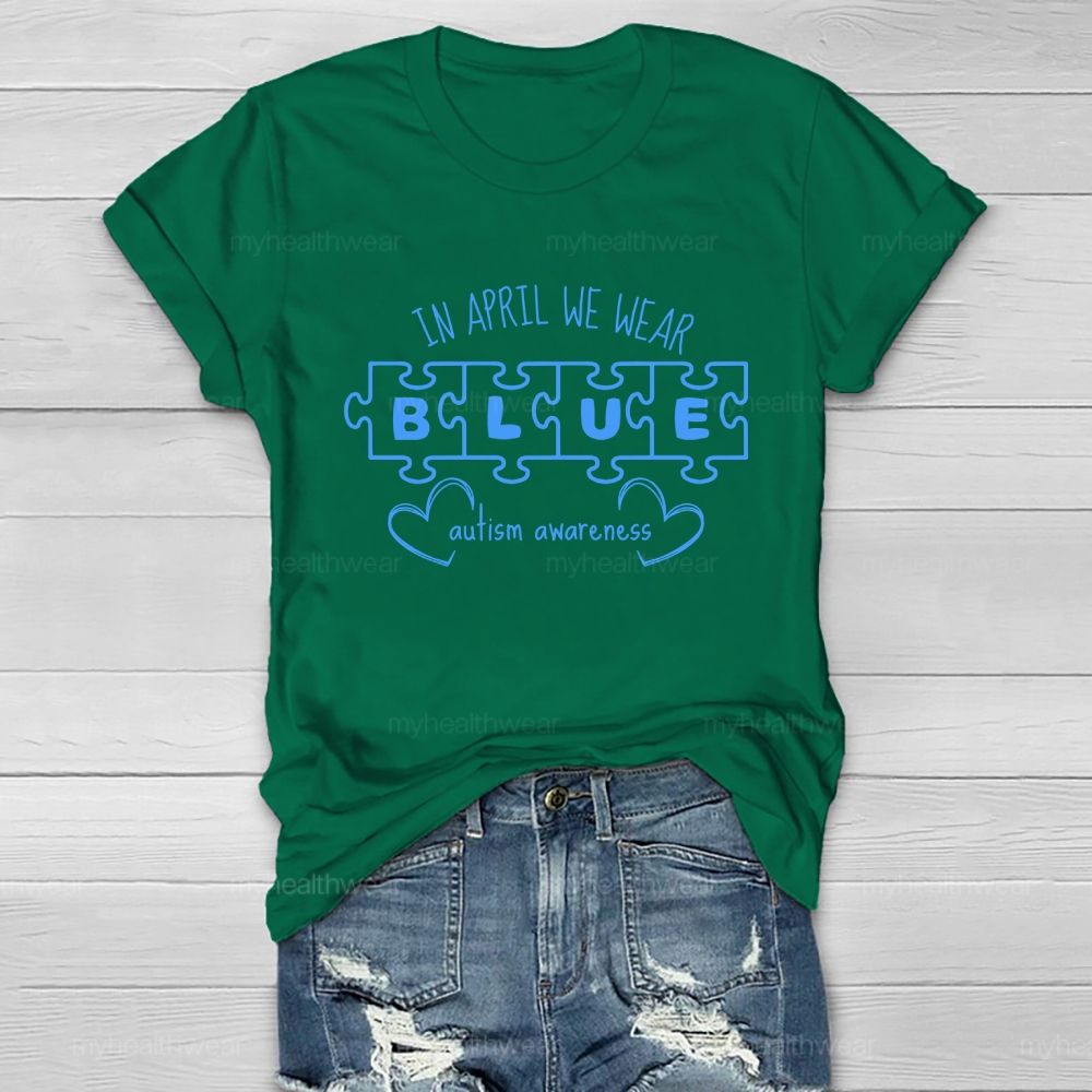 In April We Wear Blue for Autism Awareness Puzzle Piece Letters Love Healthwear T-shirt