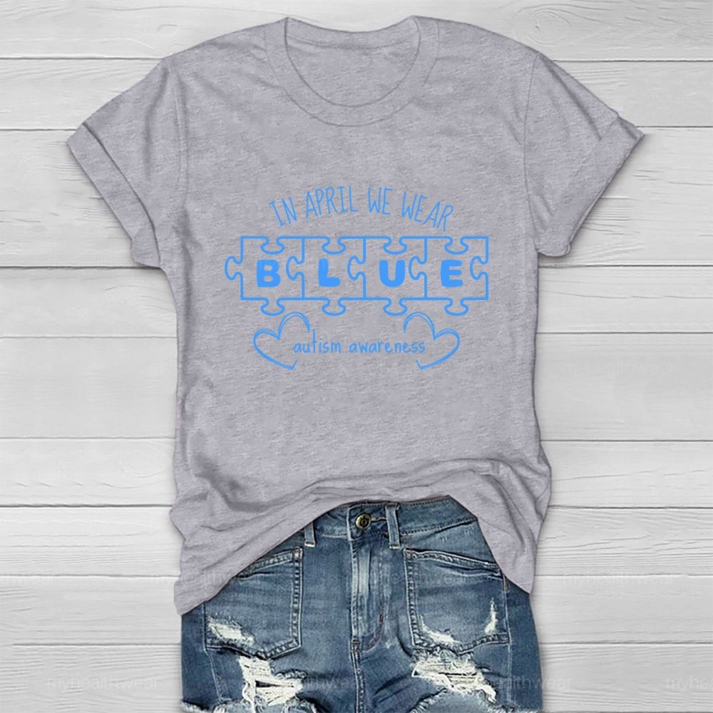 In April We Wear Blue for Autism Awareness Puzzle Piece Letters Love Healthwear T-shirt