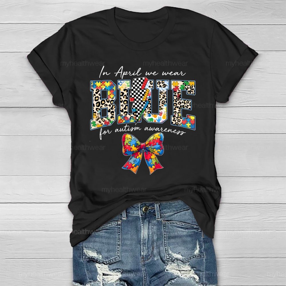 In April We Wear Blue For Autism Awareness Colorful Puzzle Bow Healthwear T-shirt
