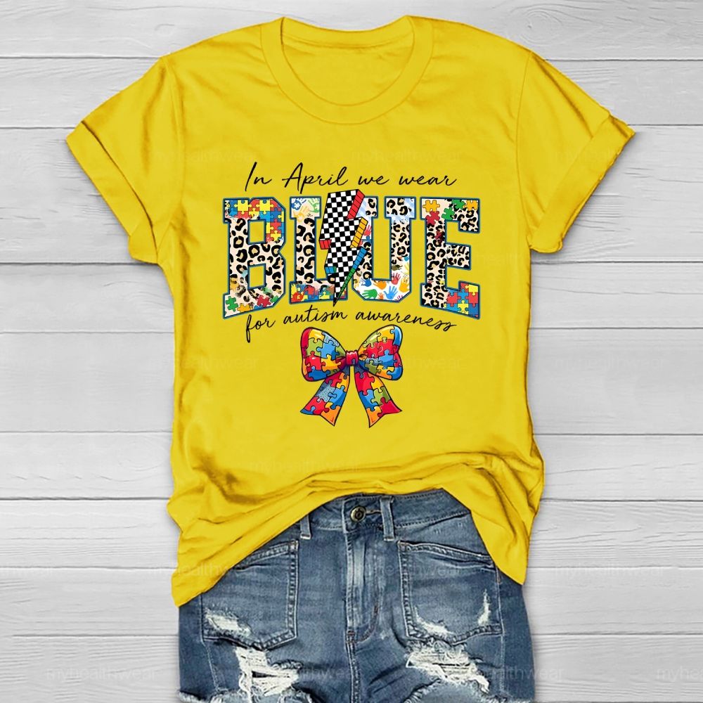 In April We Wear Blue For Autism Awareness Colorful Puzzle Bow Healthwear T-shirt