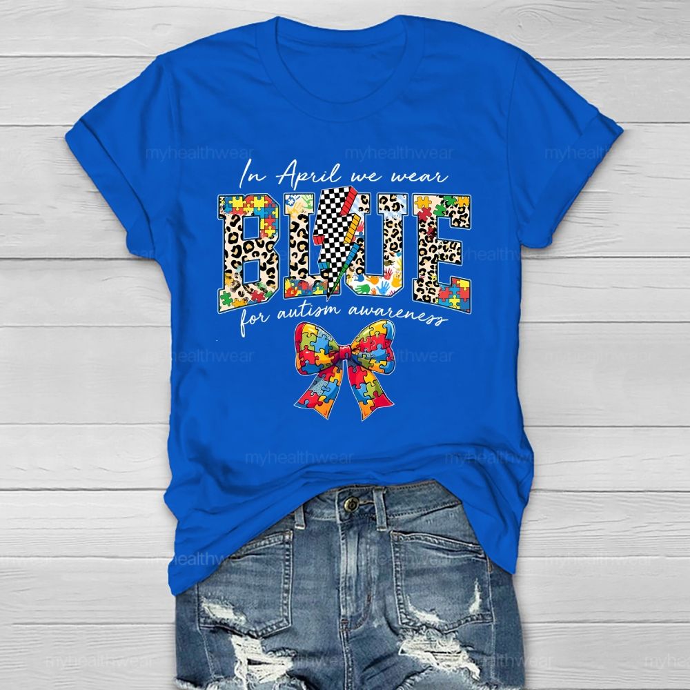 In April We Wear Blue For Autism Awareness Colorful Puzzle Bow Healthwear T-shirt