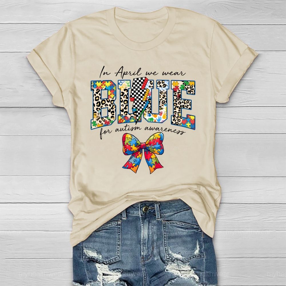 In April We Wear Blue For Autism Awareness Colorful Puzzle Bow Healthwear T-shirt
