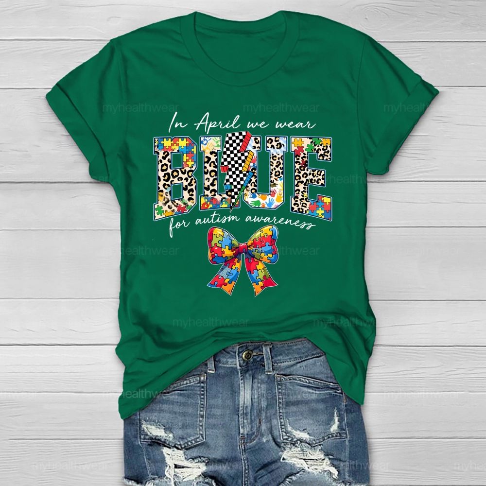 In April We Wear Blue For Autism Awareness Colorful Puzzle Bow Healthwear T-shirt