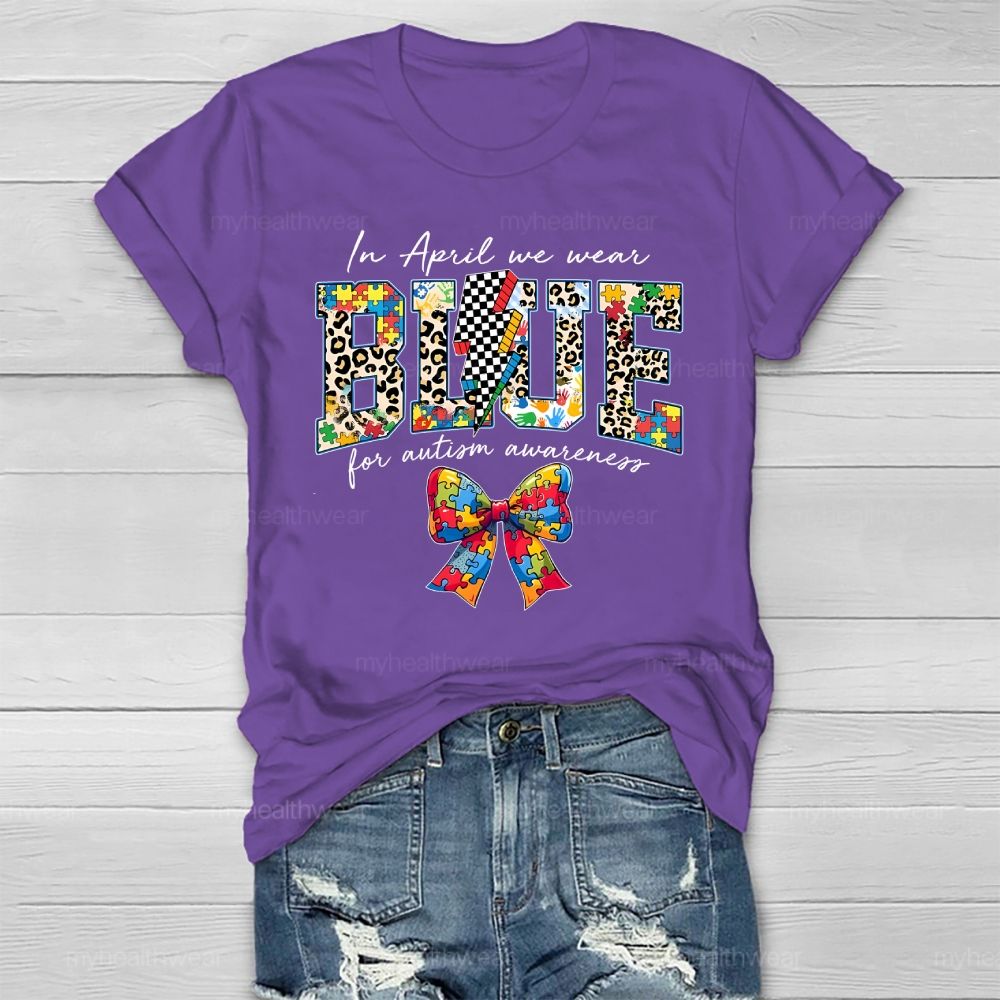 In April We Wear Blue For Autism Awareness Colorful Puzzle Bow Healthwear T-shirt
