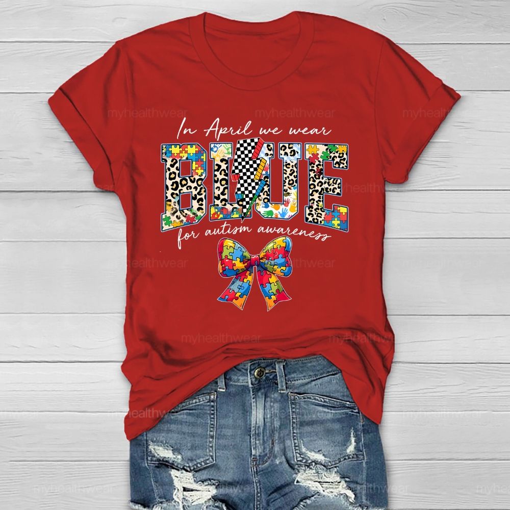 In April We Wear Blue For Autism Awareness Colorful Puzzle Bow Healthwear T-shirt