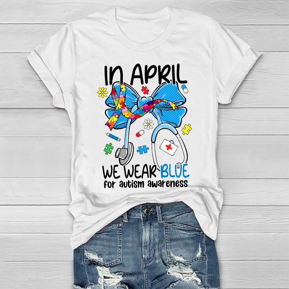 In April We Wear Blue For Autism Awareness Stethoscope Colorful Puzzle Ribbon Healthwear T-shirt