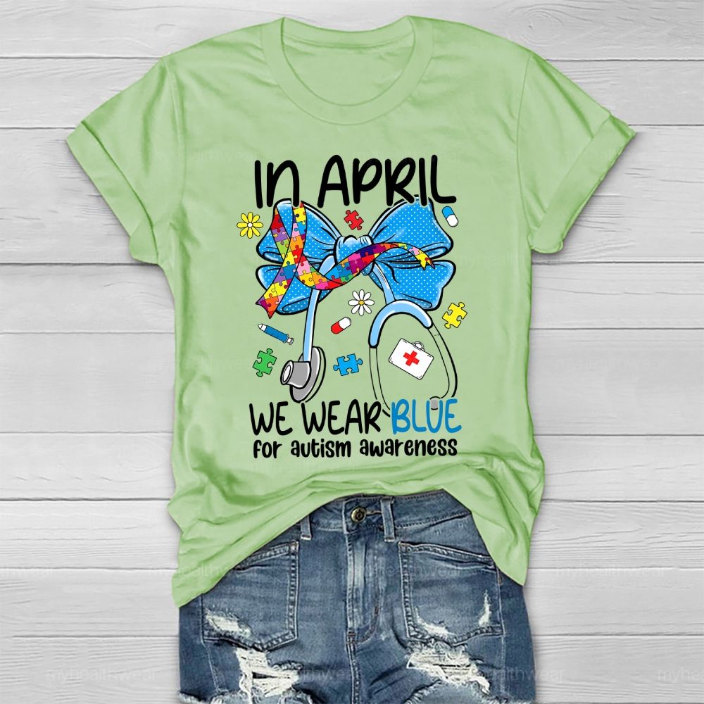 In April We Wear Blue For Autism Awareness Stethoscope Colorful Puzzle Ribbon Healthwear T-shirt