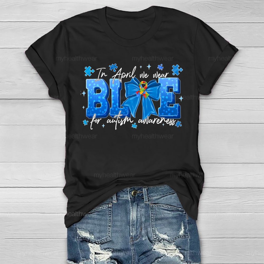 In April We Wear Blue For Autism Awareness Blue Ribbon Puzzle Ribbon Healthwear T-shirt