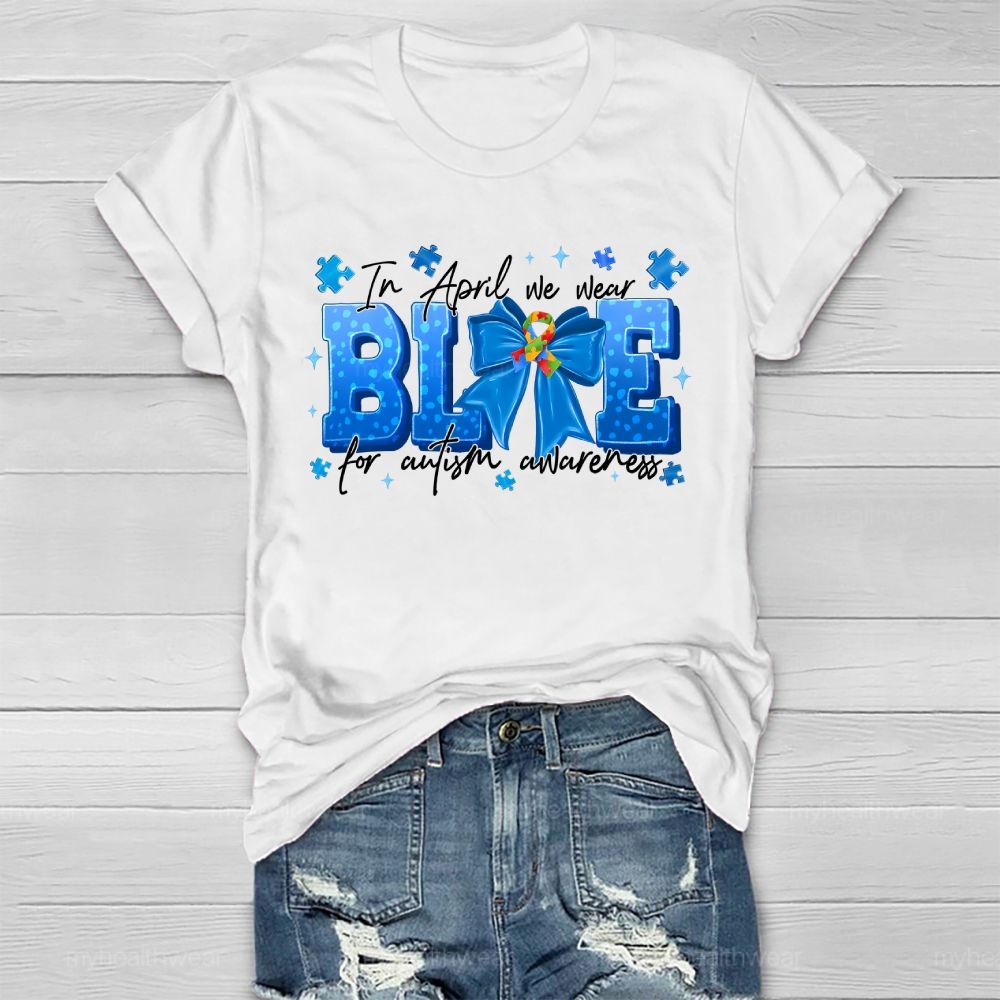In April We Wear Blue For Autism Awareness Blue Ribbon Puzzle Ribbon Healthwear T-shirt
