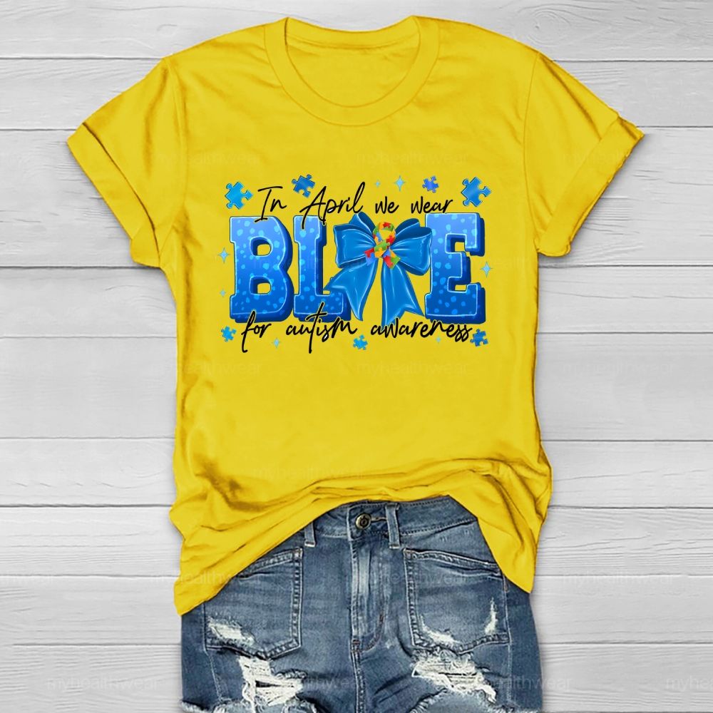 In April We Wear Blue For Autism Awareness Blue Ribbon Puzzle Ribbon Healthwear T-shirt