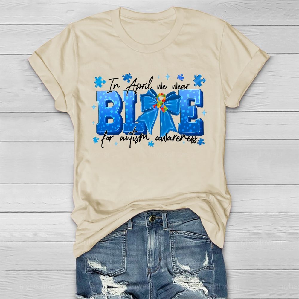 In April We Wear Blue For Autism Awareness Blue Ribbon Puzzle Ribbon Healthwear T-shirt