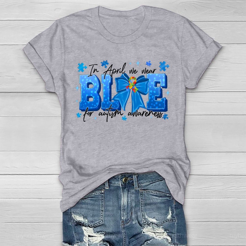 In April We Wear Blue For Autism Awareness Blue Ribbon Puzzle Ribbon Healthwear T-shirt