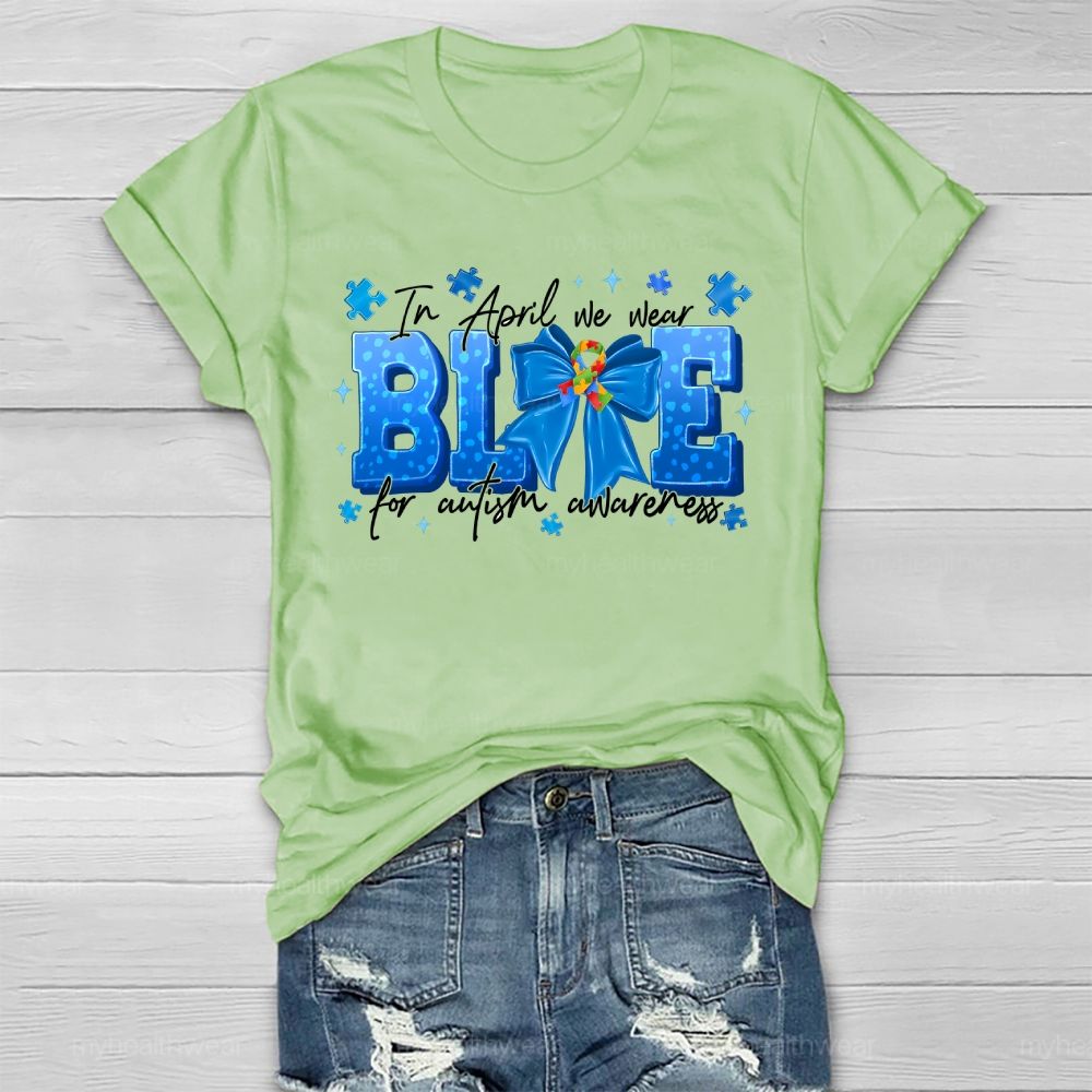 In April We Wear Blue For Autism Awareness Blue Ribbon Puzzle Ribbon Healthwear T-shirt