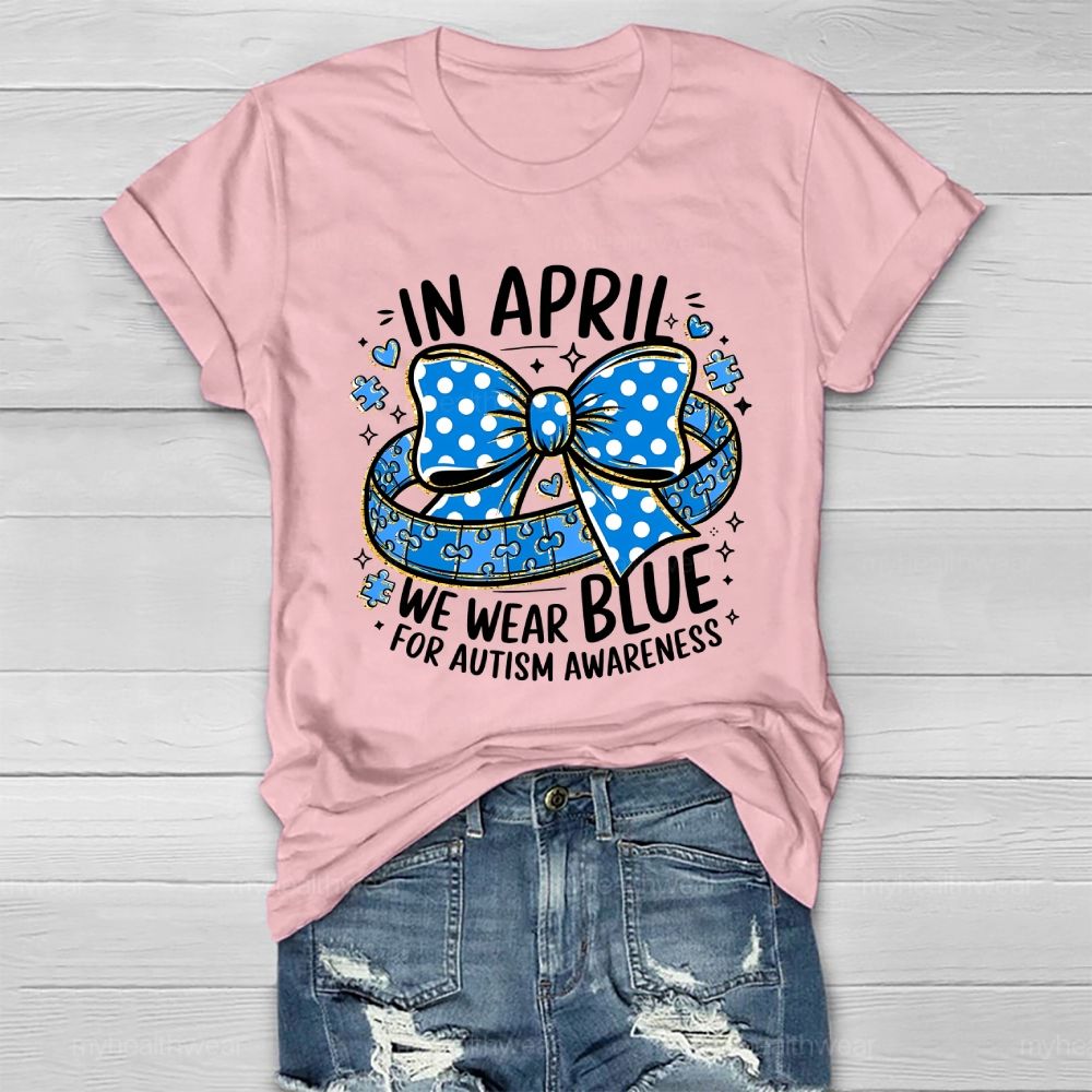 In April We Wear Blue For Autism Awareness Puzzle Pieces Polka Dots Bows Healthwear T-shirt