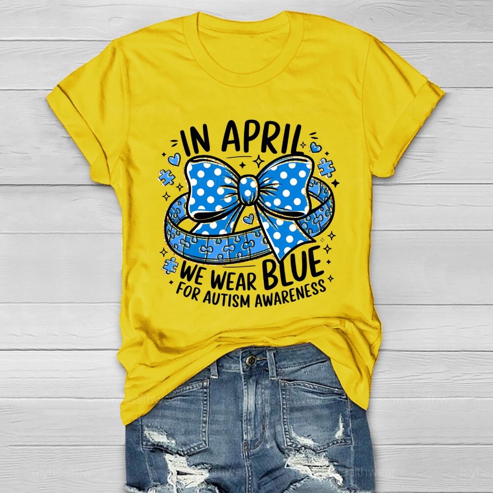 In April We Wear Blue For Autism Awareness Puzzle Pieces Polka Dots Bows Healthwear T-shirt