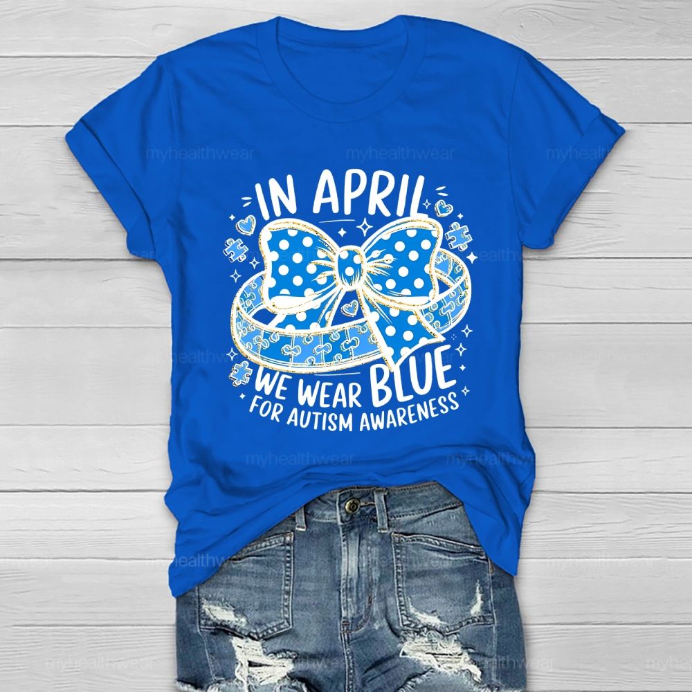 In April We Wear Blue For Autism Awareness Puzzle Pieces Polka Dots Bows Healthwear T-shirt