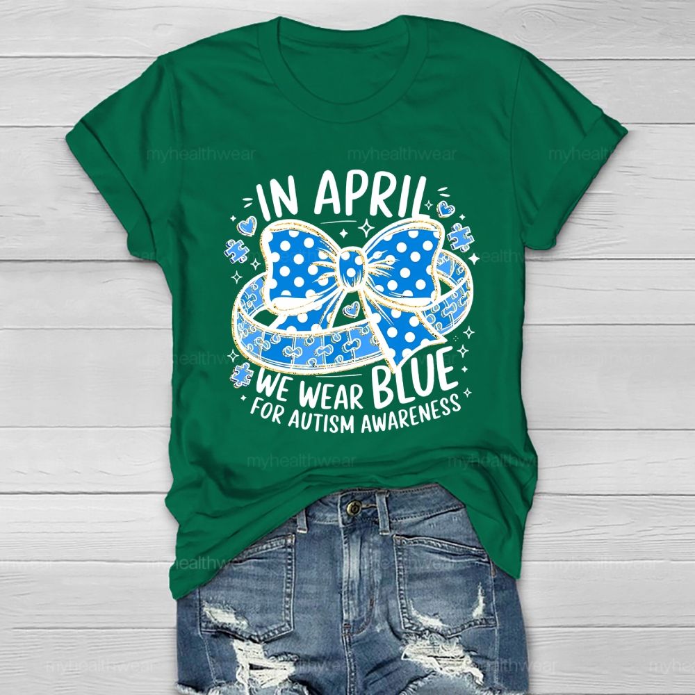 In April We Wear Blue For Autism Awareness Puzzle Pieces Polka Dots Bows Healthwear T-shirt