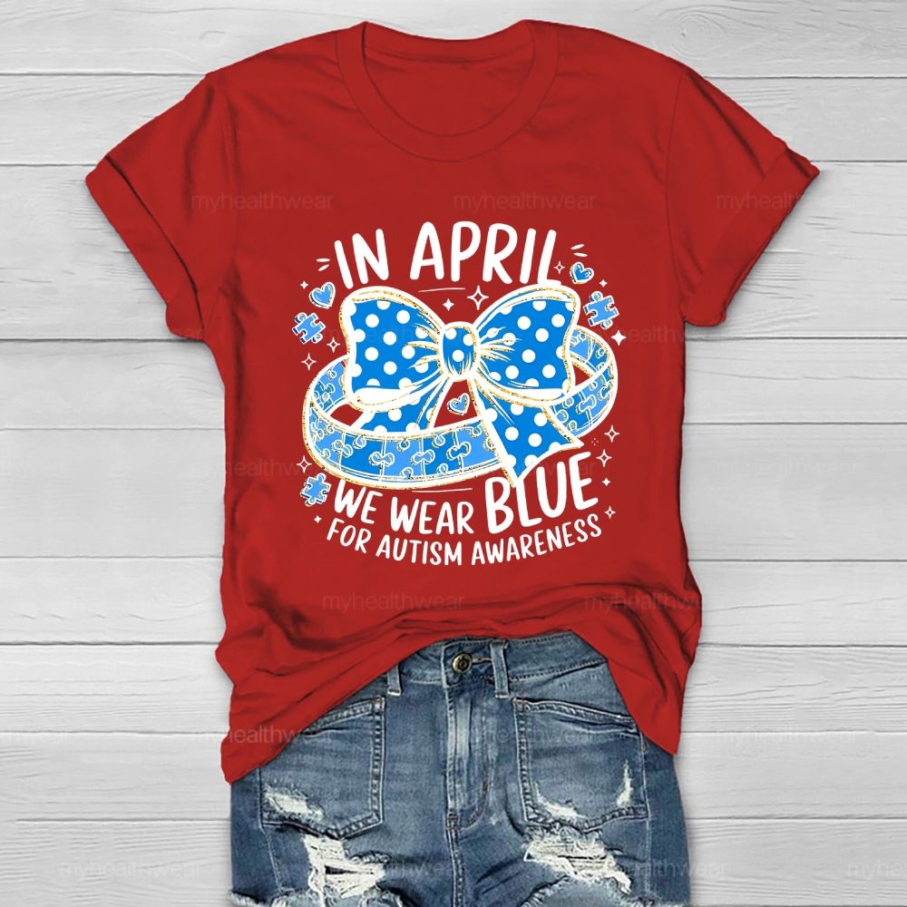 In April We Wear Blue For Autism Awareness Puzzle Pieces Polka Dots Bows Healthwear T-shirt