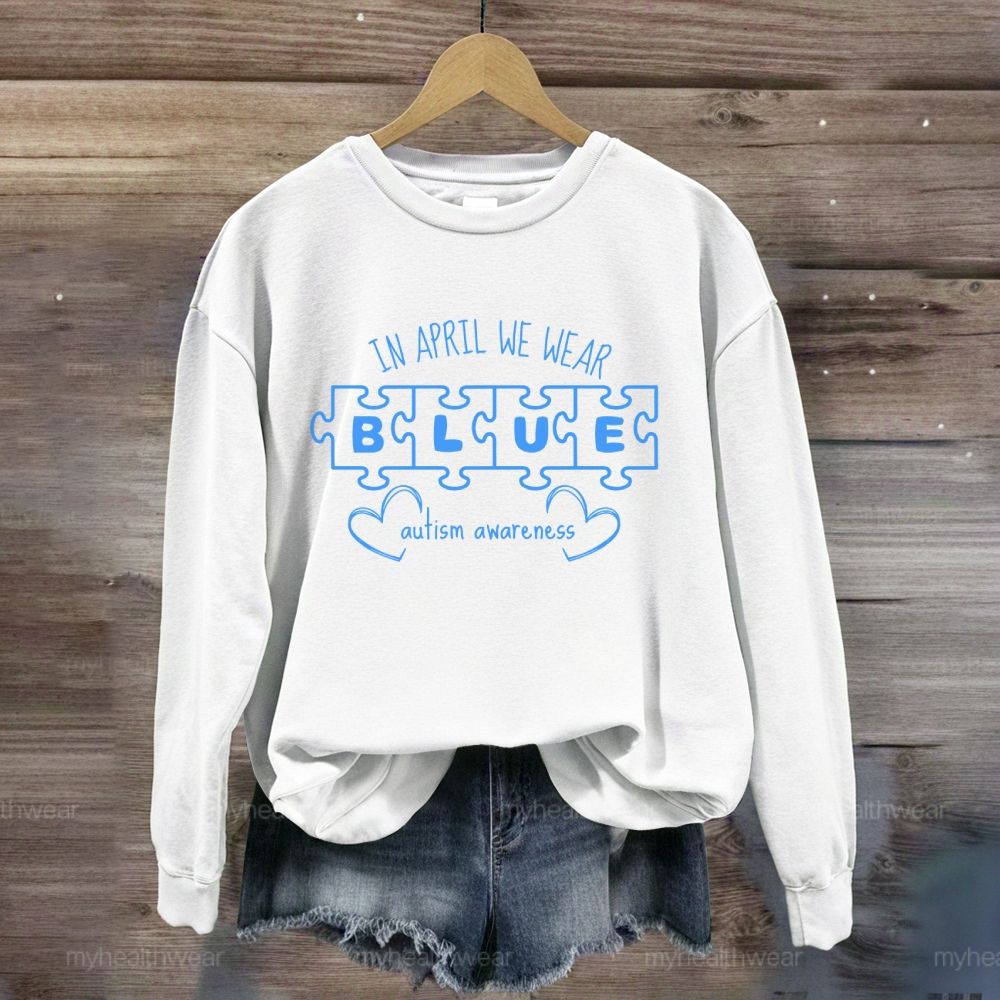 In April We Wear Blue for Autism Awareness Puzzle Piece Letters Love Sweatshirt