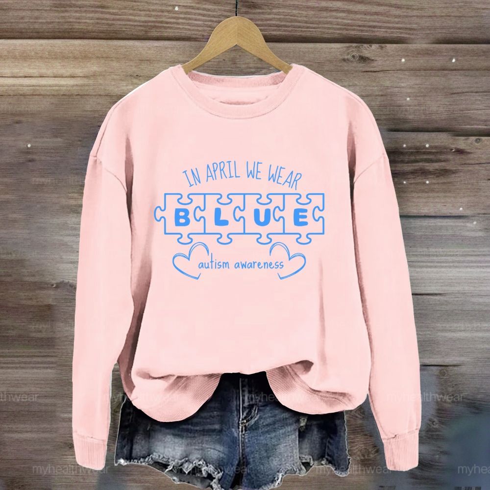 In April We Wear Blue for Autism Awareness Puzzle Piece Letters Love Sweatshirt