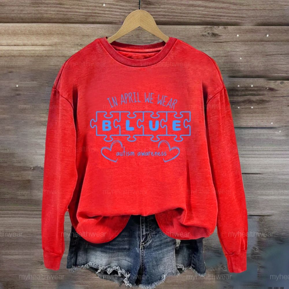 In April We Wear Blue for Autism Awareness Puzzle Piece Letters Love Sweatshirt