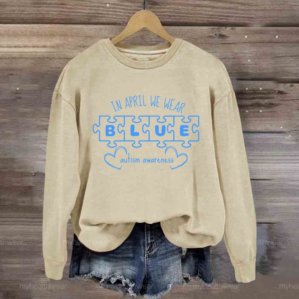 In April We Wear Blue for Autism Awareness Puzzle Piece Letters Love Sweatshirt