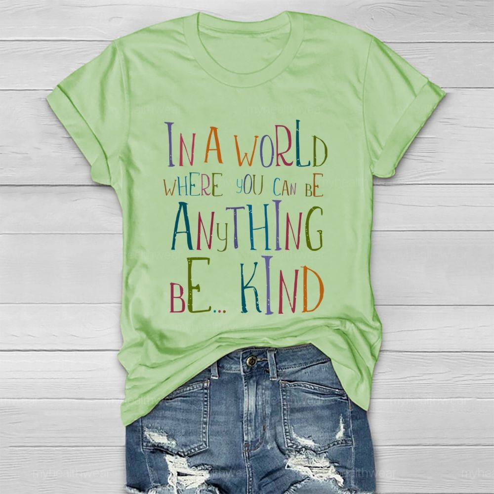 In A World Where You Can Be Anything Be... Kind Colorful Letters Graphics  Healthwear T-shirt